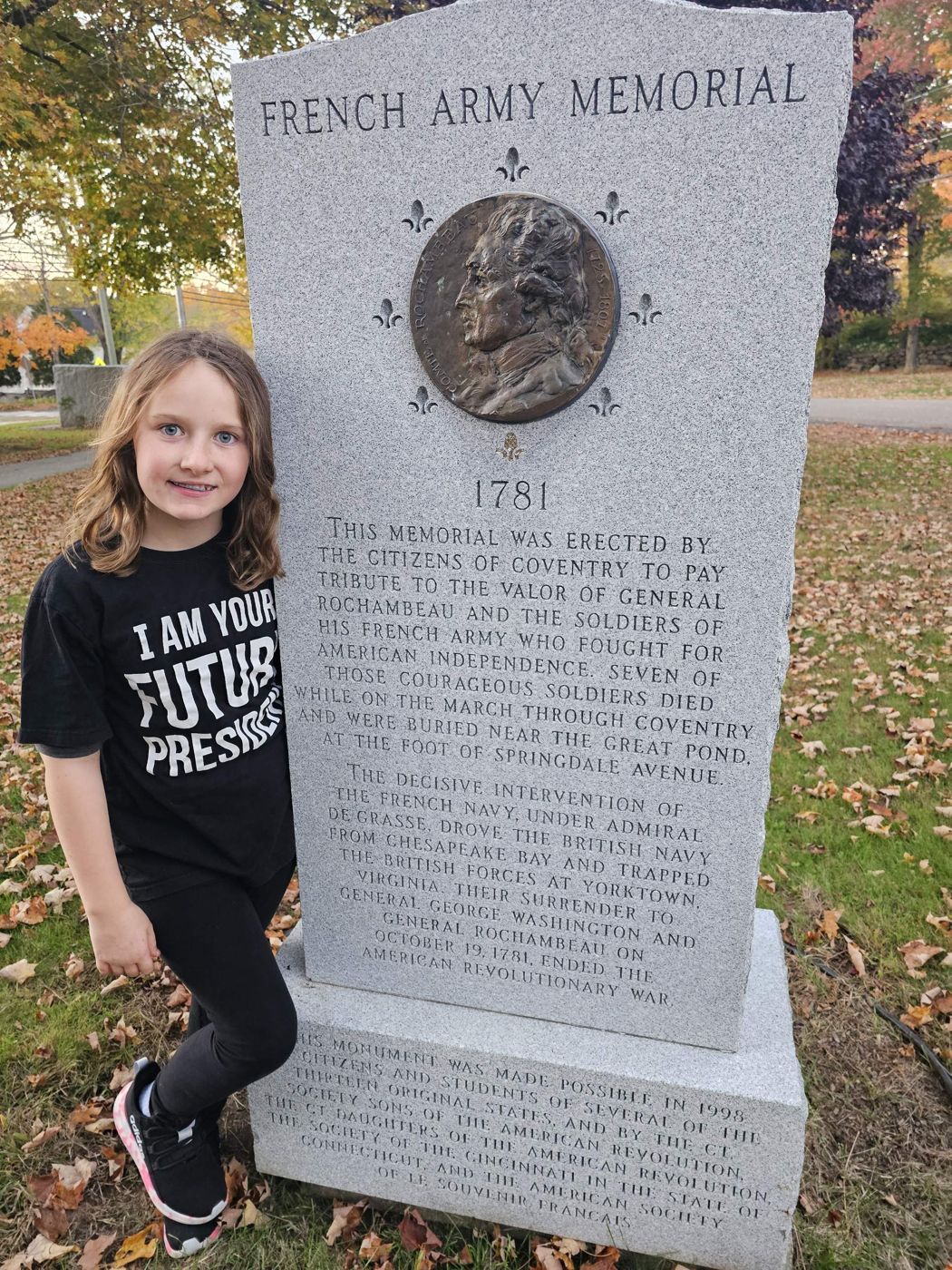 Adeline beside the French Army Memorial